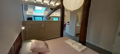 Cama o camas de una habitación en Apartamentos en Baztan HIRU KABI, BIGA