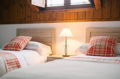 Cama o camas de una habitación en ICIAR - Dúplex by Cardi Suites