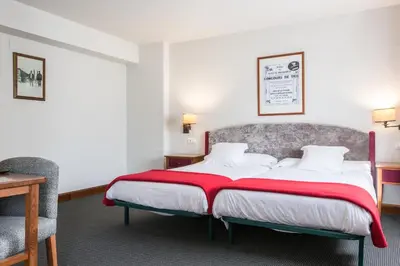 Cama o camas de una habitación en SNÖ Hotel Formigal