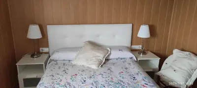 Cama o camas de una habitación en Habitaciones en planta superior independiente con piscina - barbacoa