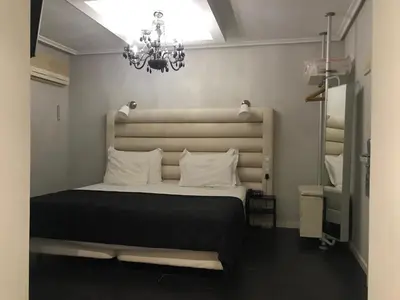 Cama o camas de una habitación en Hotel Pilar Plaza