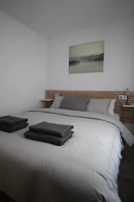 Cama o camas de una habitación en Apartamento los Pirineos Sabi
