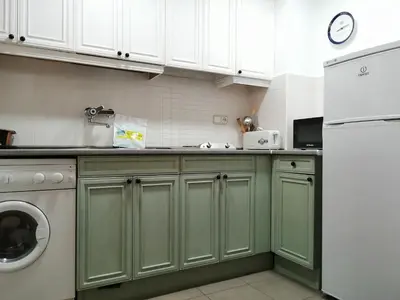 Una cocina o zona de cocina en Bajo con jardín, paz, tranquilidad y aire libre - Isard 3