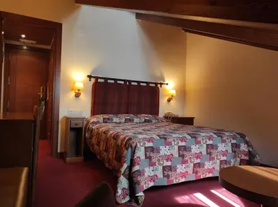 Cama o camas de una habitación en Hotel La Morera