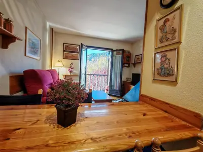 Zona de estar de Chimenea, cama grande y vistas- Escapada romántica perfecta - Falcó 16