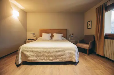 Cama o camas de una habitación en Hotel Manantial