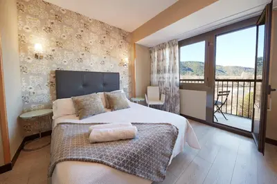Cama o camas de una habitación en Hotel Sanchez