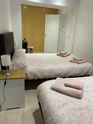 Cama o camas de una habitación en Casa Mery Pamplona