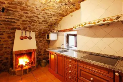 Una cocina o zona de cocina en Masia Mas d'en Bosch Casa Rural Baronia de Rialb