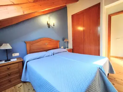Cama o camas de una habitación en CHECK-IN CASAS Casa Pedro