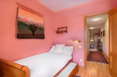 Cama o camas de una habitación en Montesqui Formigal, exclusivo ático con vistas a pistas, guardaesquis y garaje