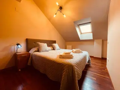 Cama o camas de una habitación en APARTAMENTOS RioMonte 5 - DeLuxe con Jacuzzi