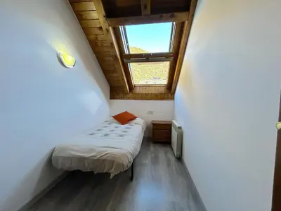Cama o camas de una habitación en Dúplex lluminós a Esterri d'Àneu by RURAL D'ÀNEU