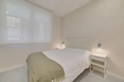 Cama o camas de una habitación en Apartamentos Pamplona Confort by Clabao