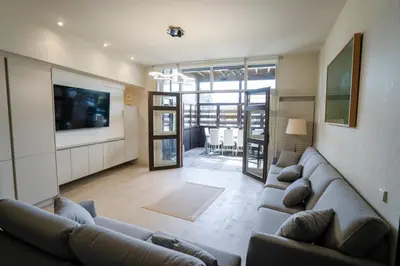 Una televisión o centro de entretenimiento en Villa-Mari