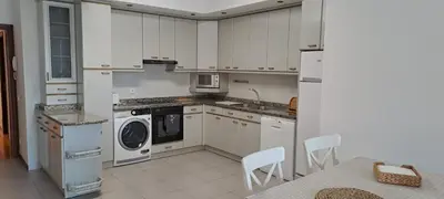 Una cocina o zona de cocina en Erdizka, céntrico apartamento turístico con la mejor vista Plaza de los Fueros