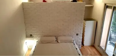 Cama o camas de una habitación en Loft luminoso y céntrico