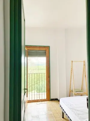 Cama o camas de una habitación en Les Cases del Moliner
