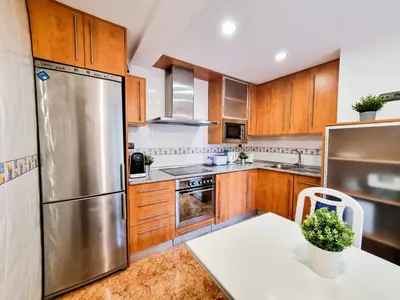 Una cocina o zona de cocina en El Reloj del Pilar ComoTuCasa