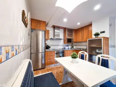 Una cocina o zona de cocina en El Reloj del Pilar ComoTuCasa