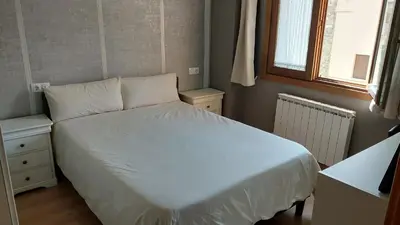 Cama o camas de una habitación en Apartamento en Villanua La Espata