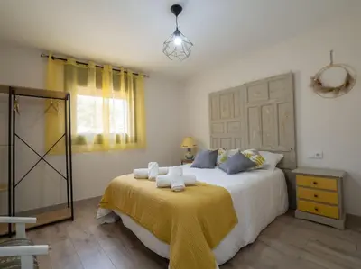 Cama o camas de una habitación en Casa Rural El Moradel Añon
