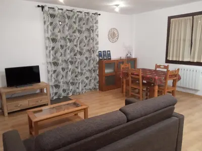 Una televisión o centro de entretenimiento en Apartamento Casa Leonora
