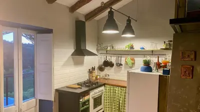 Una cocina o zona de cocina en La Guinda de Cal Talaia