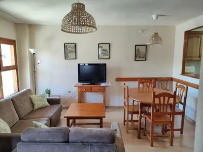 Una televisión o centro de entretenimiento en Apartamento de la Marmota Cerler