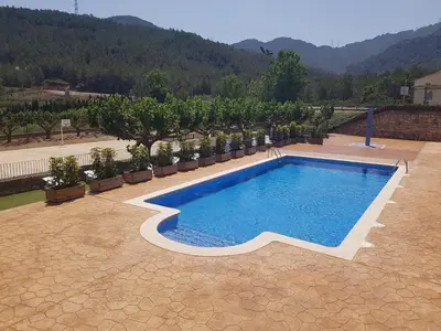 Piscina en o cerca de Mar y Montaña Masboquera