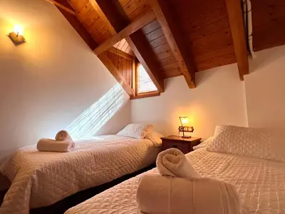Cama o camas de una habitación en Apartament La Noguera - L'Amfitriona