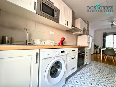 Una cocina o zona de cocina en Dos Torres Saruman - Espacioso con 7 Camas Individuales