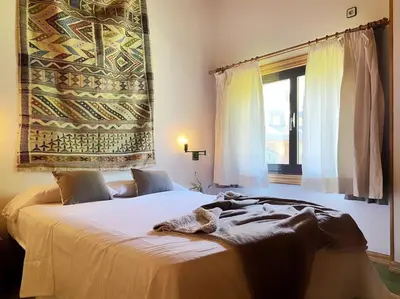 Cama o camas de una habitación en Dúplex abuhardillado con parking