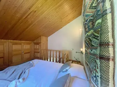 Cama o camas de una habitación en Dúplex abuhardillado con parking