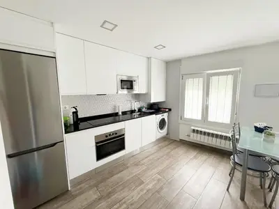Una cocina o zona de cocina en Apartamento del Puente